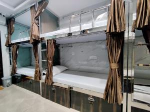Postel nebo postele na pokoji v ubytování Hotel Comfy Inn
