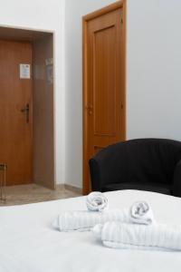 Postel nebo postele na pokoji v ubytování B&B Longobardi