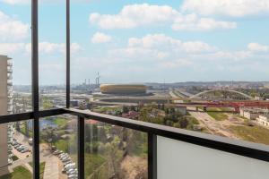 Nespecifikovaný výhled na destinaci Gdaňsk nebo výhled na město při pohledu z apartmánu