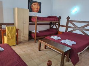 Cama ou camas em um quarto em Hostería Austral