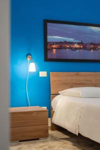 Postel nebo postele na pokoji v ubytování B&B Longobardi