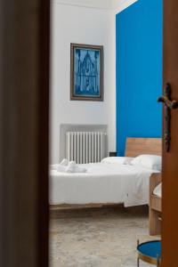 Postel nebo postele na pokoji v ubytování B&B Longobardi