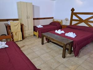 Cama ou camas em um quarto em Hostería Austral