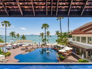 an overhead view of the pool at the resort at Pullman Pattaya Hotel G in Pattaya North