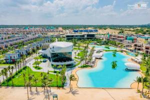 an aerial view of a resort with a swimming pool at LUX VILLA THE TROPICANA NOVAWORLD HỒ TRÀM in Ấp Thanh Bình