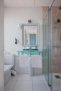 Ванна кімната в Hôtel de La Plage