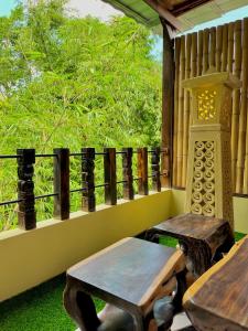 Rõdu või terrass majutusasutuses BAMBOO OASIS