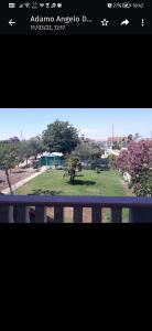Blick auf einen Park aus dem Fenster in der Unterkunft Villa Adamo in Santa Maria Del Focallo