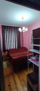 Ένα ή περισσότερα κρεβάτια σε δωμάτιο στο Guest House David +41 φωτογραφίες