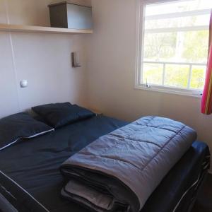 Postel nebo postele na pokoji v ubytování Camping de la Baie-Baie de Somme-Sites et Paysages