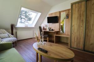 TV a/nebo společenská místnost v ubytování Hotel Das kleine Glück - Adults Only