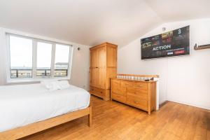 伦敦Sunny Maisonette with views over Canary Wharf, London的相册照片