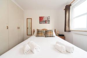 伦敦Sunny Maisonette with views over Canary Wharf, London的相册照片