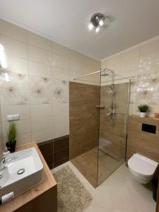 Kúpeľňa v ubytovaní Apartamenty ''Chcę Tu Zostać''