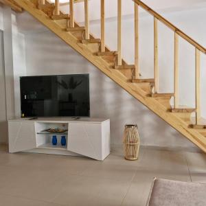 Телевизор и/или развлекательный центр в Ivoni Family House