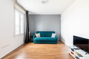 O zonă de relaxare la GuestReady - Studio confortable à Romainville