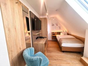Postel nebo postele na pokoji v ubytování Gästehaus Seeblick