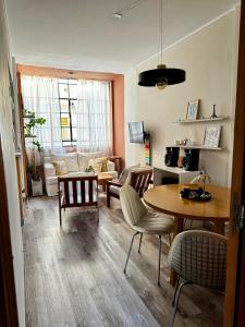 Et opholdsområde på Cálido y céntrico departamento!