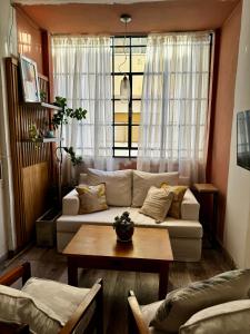 Et opholdsområde på Cálido y céntrico departamento! + 3 billeder