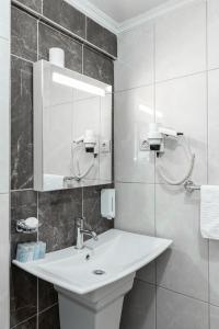 Koupelna v ubytování BURSA LOYAL CiTY HOTEL