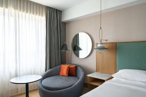 Postel nebo postele na pokoji v ubytování Hyatt Regency Nairobi Westlands