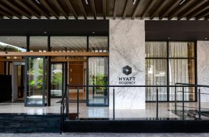 an entrance to a building with a sign on it at Hyatt Regency Nairobi Westlands in Nairobi