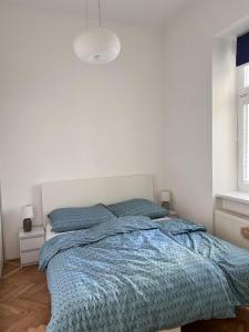 Posteľ alebo postele v izbe v ubytovaní Stylish flat in city centre
