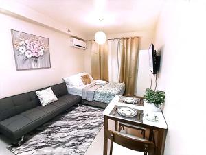 Posezení v ubytování Condo in Lapu-Lapu wd 3 Pools free wifi&Netflix + 15 fotografií