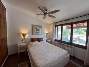 En eller flere senge i et værelse på Torre Vella 66