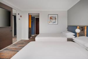 Postel nebo postele na pokoji v ubytování Glasgow Marriott Hotel