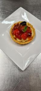 a small dessert on a white plate on a table at The Chantry hotel in Dronfield