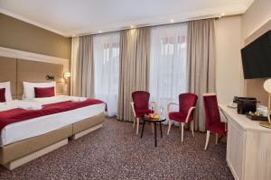 TV in/ali zabaviščno središče v nastanitvi Hotel St.Gotthard