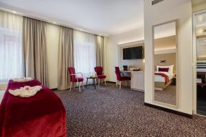 TV in/ali zabaviščno središče v nastanitvi Hotel St.Gotthard