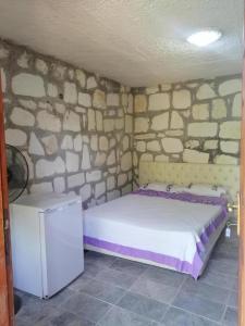 Postel nebo postele na pokoji v ubytování Heredot's house