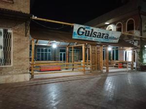 a building with a sign that reads gulaskar theater at Hostel Gulsara in Samarkand