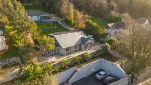 an aerial view of a house with a garage at Foxgloves retreat in Torquay