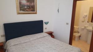 Koupelna v ubytování Hotel 4 Mori
