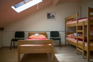 Un ou plusieurs lits superposés dans un hébergement de l'établissement Hostel Kumrovec - Bed & Breakfast