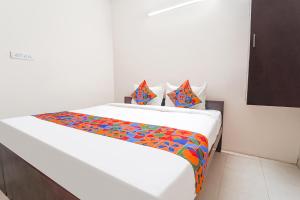 Postel nebo postele na pokoji v ubytování FabExpress Epic Residency - Nr SRM University, Ramapuram