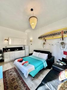 Posteľ alebo postele v izbe v ubytovaní surf house