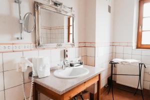 Koupelna v ubytování Sattlerhof Genießerhotel & Weingut + 37 fotografií