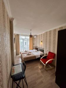 Postel nebo postele na pokoji v ubytování Hotel Marioni
