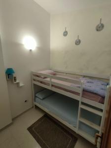 Letto o letti in una camera di A 300 passi dal mare
