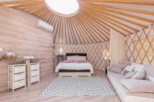 Voodi või voodid majutusasutuse L.stile Glamping toas