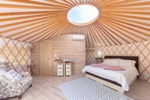 Voodi või voodid majutusasutuse L.stile Glamping toas