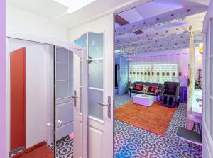 a dressing room with purple walls and a purple ceiling at President Apartments villa SPA in Vilnius