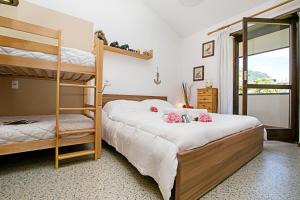 Posteľ alebo postele v izbe v ubytovaní Residence Christina Due Laghi - Happy Rentals