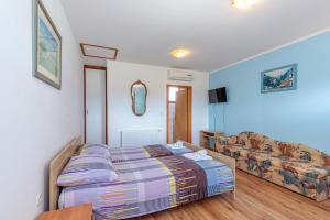 Posteľ alebo postele v izbe v ubytovaní Pool & Fun House Betiga 1 with Gym