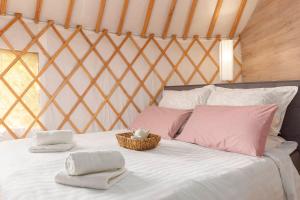 Voodi või voodid majutusasutuse L.stile Glamping toas