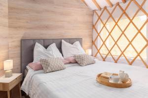 Voodi või voodid majutusasutuse L.stile Glamping toas